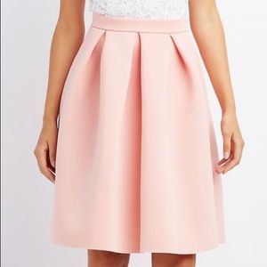 Pink mid length scuba skirt with pleats